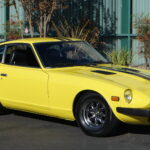 Bright Yellow 1977 Datsun 28OZ - Sold at Johnston Motorsports